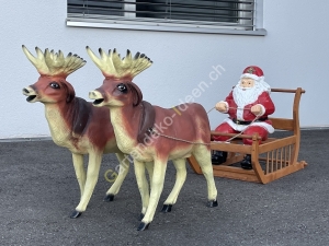 Weihnachtsmann als Rentierschlitten Deko