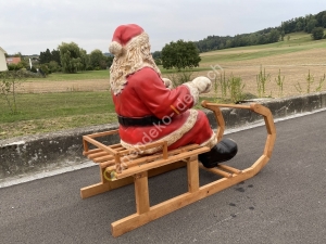 lebensgross Weihnachtsmann mit Schlitten 